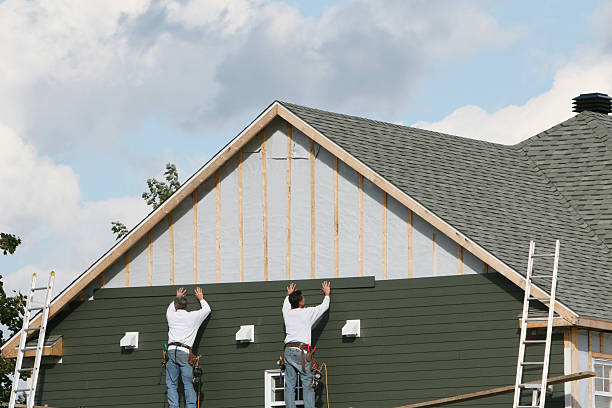 Professional Siding technician working in Cedar Grove, IN